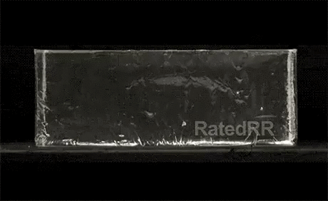Slow motion of 9mm hollow point bullet fired into a block of ballistic gel